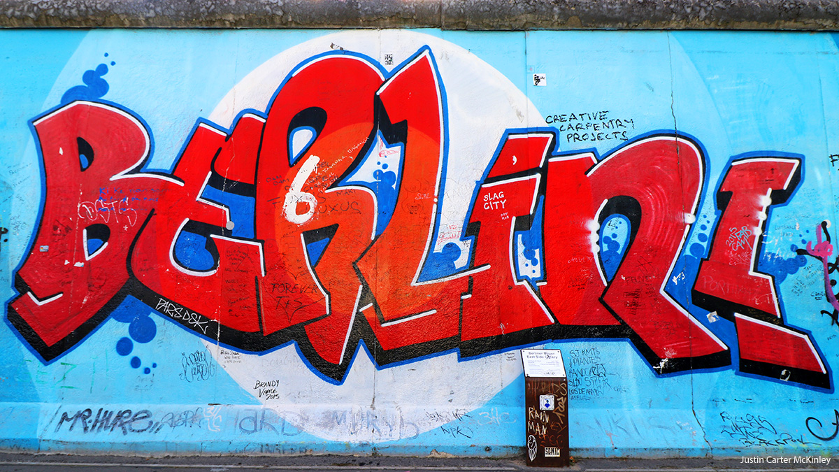 "Berlin" in red on the Berlin Wall