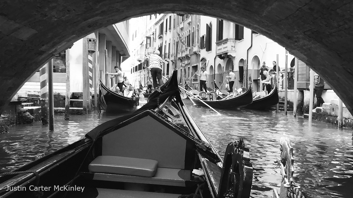 Cinematic Italy - Black and White - Venice Gondola Ride Passing Under a Bridge - A Busy Morning on the Canals